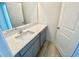 Bathroom featuring large vanity, modern sink, and hardwood floors at 169 Steel Springs Lane Rd # 17, Angier, NC 27501