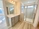 Featuring hardwood floors, this new bathroom has a modern vanity and a shower at 169 Steel Springs Lane Rd # 17, Angier, NC 27501