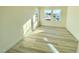 Bedroom with hardwood floors, bright natural light, and double-paned windows at 169 Steel Springs Lane Rd # 17, Angier, NC 27501