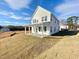 Stunning new two-story home featuring a covered patio and freshly landscaped yard at 169 Steel Springs Lane Rd # 17, Angier, NC 27501