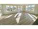 Bright living room with luxury vinyl plank flooring, recessed lighting, and large windows offering ample natural light at 169 Steel Springs Lane Rd # 17, Angier, NC 27501