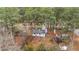 Aerial view of a cozy home nestled among trees and a well-maintained yard at 1804 Beverly Rd, Rocky Mount, NC 27801