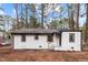 Charming home with a brick exterior, black trim, and well-manicured lawn at 1804 Beverly Rd, Rocky Mount, NC 27801