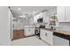 Modern kitchen featuring white cabinets, stainless steel appliances, and an open layout at 1804 Beverly Rd, Rocky Mount, NC 27801