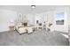 Spacious main bedroom with carpet, natural light, white trim, and matching furniture at 185 Horseshoe Pl # 54, Angier, NC 27501