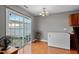 Bright dining area with sliding glass doors and hardwood floors at 1952 Grassy Banks Dr, Raleigh, NC 27610