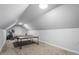 Bright bonus room with lots of space for activities and a ping pong table, as well as an elliptical at 2030 Lonesome Dove Dr, Franklinton, NC 27525