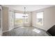 Breakfast nook with large windows offering plenty of natural light and views of the backyard at 2030 Lonesome Dove Dr, Franklinton, NC 27525