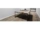Bright basement room with a ping pong table and neutral walls provides plenty of entertainment space at 2030 Lonesome Dove Dr, Franklinton, NC 27525