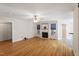 Spacious living room featuring hardwood floors, fireplace, and abundant natural light at 2030 Lonesome Dove Dr, Franklinton, NC 27525