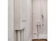Utility room with an electrical panel, white walls, and utility connections at 210 S General Lee Ave, Dunn, NC 28334