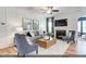 Bright living room features a fireplace, stylish furniture, modern decor, and natural light at 2152 Pink Peony Cir # 155, Durham, NC 27703