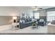 Inviting living room with a comfortable sofa, stylish decor, and ample natural light at 2152 Pink Peony Cir # 155, Durham, NC 27703
