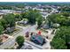 Charming home aerial view, highlighted by lush surroundings and convenient access to the neighborhood at 221 Charlotte Ave, Sanford, NC 27330