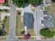 Aerial view of the home showing roof, landscaping, and off-street parking at 221 Charlotte Ave, Sanford, NC 27330