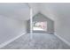 Finished attic with carpet, white walls, and window with view at 221 Charlotte Ave, Sanford, NC 27330
