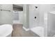 This bathroom has a large, modern shower with marble accents and a soaking tub at 221 Charlotte Ave, Sanford, NC 27330