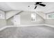 Bedroom with a ceiling fan, neutral walls, and carpet flooring at 221 Charlotte Ave, Sanford, NC 27330