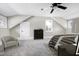 Bedroom with a ceiling fan, gray walls, and carpet flooring at 221 Charlotte Ave, Sanford, NC 27330