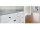 Close-up of built-in cabinets with granite countertop and modern hardware at 221 Charlotte Ave, Sanford, NC 27330