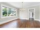 Dining room with hardwood floors and views of the outside at 221 Charlotte Ave, Sanford, NC 27330