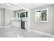 Kitchen with white cabinets, stainless steel appliances, granite countertops and subway tile backsplash at 221 Charlotte Ave, Sanford, NC 27330