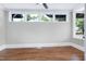 Bright room with hardwood floors and ample natural light at 221 Charlotte Ave, Sanford, NC 27330