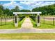 Scenic entrance to the Bark Park at Georgia's Landing, with a bridge leading to fun for your furry friends at 232 Augusta Pond Way # 124, Raleigh, NC 27603