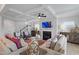 Cozy living room features a fireplace, built-ins, coffered ceiling and neutral decor at 232 Augusta Pond Way # 124, Raleigh, NC 27603