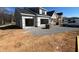 New construction home featuring a two-car garage and classic architectural details at 2328 Eagle Shot Ct # 18, Fuquay Varina, NC 27526
