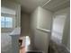 Neutral hallway with doors leading to bedrooms with neutral carpet and a window at 271 Mayors Lane Ln, Wendell, NC 27591