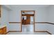 View into dining area with wood paneling at 2720 Amherst Ave, Burlington, NC 27215