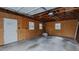Interior of the garage, showing unfinished walls, concrete floors, and exposed ceiling at 2720 Amherst Ave, Burlington, NC 27215