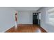 Spacious living room with hardwood floors and access to other rooms at 2720 Amherst Ave, Burlington, NC 27215