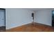 Cozy living room featuring hardwood floors and freshly painted walls at 2720 Amherst Ave, Burlington, NC 27215
