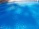 Captivating, clear, blue, in-ground pool perfect for swimming and escaping the summer heat at 2930 Hostetler St, Raleigh, NC 27609