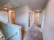 Upstairs hallway leading to multiple rooms, carpeted flooring and recessed lighting at 394 Duncan Creek Rd # 158, Lillington, NC 27546