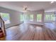 Bright living room with large windows and hard wood floors at 394 Duncan Creek Rd # 158, Lillington, NC 27546