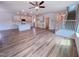 An open-concept living room features new hard wood flooring and a ceiling fan at 394 Duncan Creek Rd # 158, Lillington, NC 27546