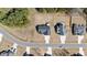 Overhead shot capturing the home's location within a quiet neighborhood, surrounded by tree-lined streets at 405 Joseph Alexander Dr, Fuquay Varina, NC 27526