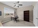 Bedroom with neutral walls, carpeted floor, ceiling fan, desk and built-in shelves at 405 Joseph Alexander Dr, Fuquay Varina, NC 27526