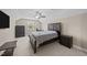 Bedroom with neutral walls, carpeted floor, ceiling fan and dark wood furniture at 405 Joseph Alexander Dr, Fuquay Varina, NC 27526