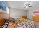 Bedroom with carpeting, ceiling fan, natural light, and simple decor at 405 Joseph Alexander Dr, Fuquay Varina, NC 27526