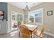 Dining room with natural light and views of the backyard at 405 Joseph Alexander Dr, Fuquay Varina, NC 27526