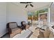 Screened-in patio with comfortable seating and a view of the backyard at 405 Joseph Alexander Dr, Fuquay Varina, NC 27526