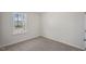 Carpeted bedroom featuring a window at 413 Citron St, Sanford, NC 27332