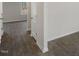 Hallway showing LVP floors, neutral walls, doors to rooms, and electrical outlets at 413 Citron St, Sanford, NC 27332