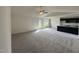 Spacious living area featuring an open floor plan to the kitchen, and lots of natural light at 44 Harvest Hills Ln, Dunn, NC 28334