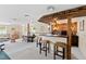 Finished basement with a bar area, seating, and an open layout at 5008 Hermitage Dr, Raleigh, NC 27612