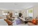 Finished basement featuring multiple windows, seating, and a comfortable layout at 5008 Hermitage Dr, Raleigh, NC 27612